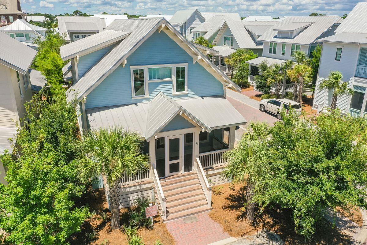 Amazing luxury beach home south of 30A in Prominence. This home has it all: two-car garage, first-floor master suite, two guest bedrooms and two additional bunk rooms for plenty of heads in beds for rental income. Upgrades include: custom wood shelves, quartz countertops, and solid wood kitchen island. The open living, dining and kitchen are ideal for family get togethers and entertaining. Wood flooring runs throughout the living areas of the first floor. Shiplap and wainscoting offer that beachy, upscale feel for 30A. Two screen porches - one on the front of the home and the other on the back will be great for relaxing after a day at the beach. Extra closets and storage offer ample space for everything you'll need.