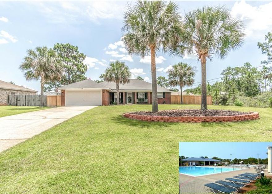 Immaculately kept, sprawling and spacious 4 bedroom 2 bath brick home in the heart of Holley By the Sea. Excellently located near Hurlburt field, come check out this gem on a fully privacy fenced half acre. Pull into the long driveway, large enough for 6 cars, or park in the roomy 2 car garage. A southern front porch greets your entry, glass storm door, and a tiled foyer for easy upkeep. Wood like floors encompass the huge dining and living room with vaulted ceilings and upgraded fixtures. A breakfast bar divides the open concept kitchen from the breakfast room and living room. Stainless appliances, Shaker style cabinets, loads of counter space, and tiled backsplash round out the ample kitchen. The Master invites with his and hers closets, a separate shower, garden tub, and