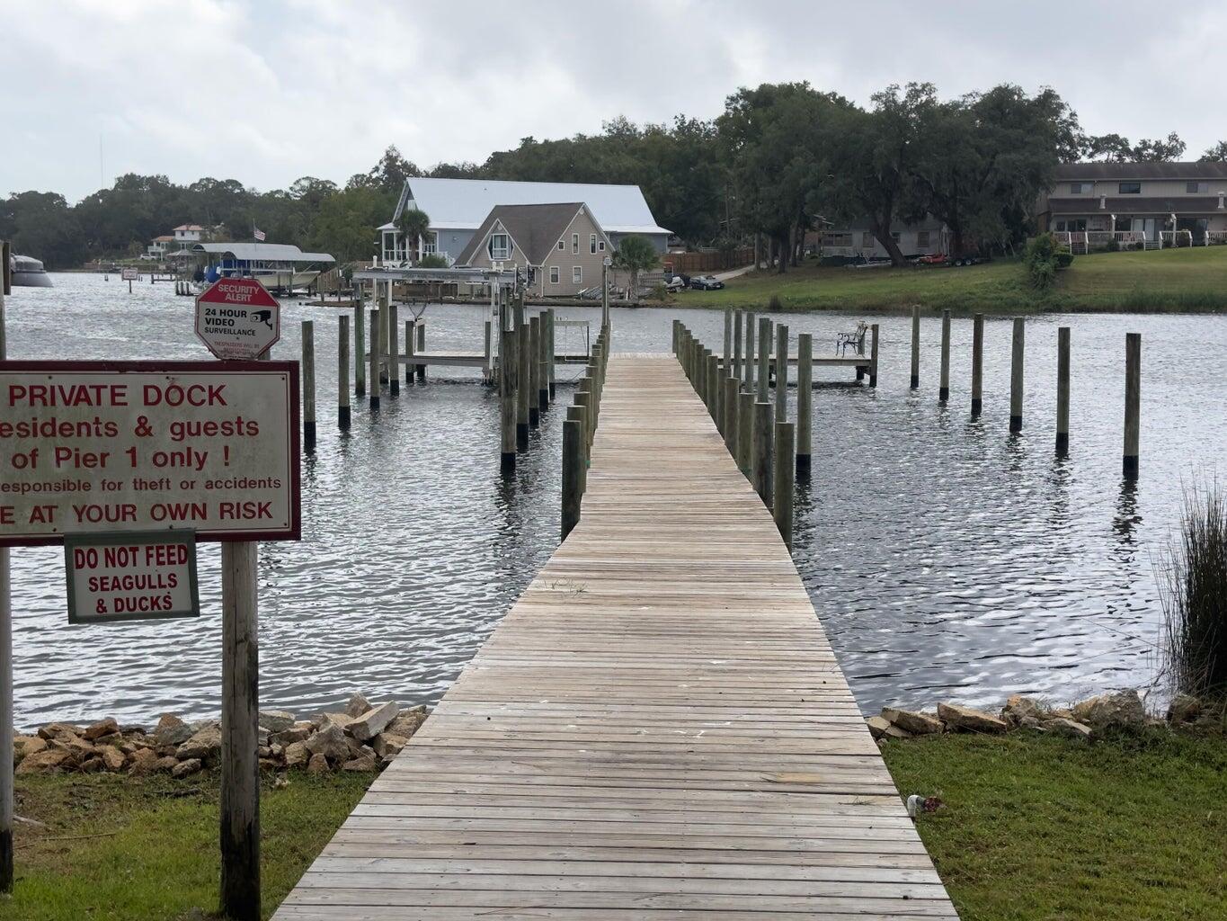 Fresh/Clean & Updated! Washer & Dryer Included! Community Water access and Pool! All New Stainless Appliances - New plugs and Switches throughout - New HVAC - New Ceiling Fans! Convenient Location close to Beaches, Bases, Hospital, Lowes, Walmart & Sam's Club! The complex offers temporary boat slips on a first come basis, fishing dock and pool! Tennis court for active lifestyles and a waterfront pool overlooking scenic Cinco Bayou. Large living/dining room with Low Maintenance LVP Floors and a storage closet. The Updated, Eat-Kitchen opens to the back patio where you can roll your kayak straight down to the water! 2 Nicely sized Bedrooms and a Full Bath! Tile & LVP Flooring No Carpet! Easy Living! The community pool has also had recent upgrades and is located right next to the dock. One assigned parking space & overflow parking towards the front. A full size washer and dryer are included and the complex also has a nice, onsite laundry facility. This is a peaceful, centrally located condo for easy, low maintenance living! Minimum FICO Score of 680 is requested.