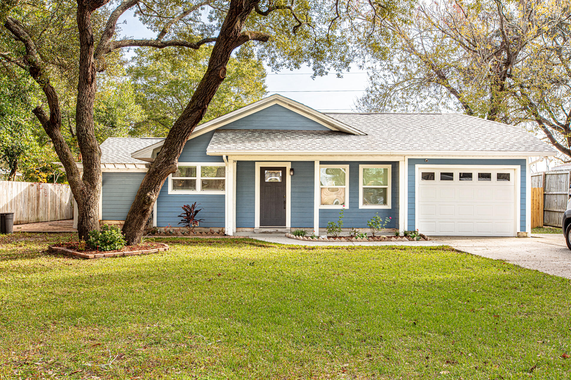 BACK ON MARKET DUE TO FINANCING-Experience the allure of this exquisitely renovated contemporary home, featuring three spacious bedrooms and two elegantly designed bathrooms, nestled in the vibrant heart of Fort Walton Beach. This move-in ready treasure showcases a stunning array of modern upgrades, highlighted by striking hardwood board siding that elevates its curb appeal to new heights. The meticulously redesigned kitchen is a culinary dream, outfitted with top-of-the-line appliances and designed for both beauty and practicality. Each step on the luxurious vinyl plank floors speaks to the home's quality of design and comfort. As you step inside, you are welcomed by an expansive open-concept living room and kitchen. The layout creates a seamless flow that is perfect for entertaining loved ones or enjoying cozy nights at home. Natural light floods the space through generous windows, illuminating the finishes and inviting warm tones that invite you to relax.

Picture yourself savoring your morning coffee beneath the charming pergola in your backyard, embraced by the soothing sounds of naturea perfect spot to recharge. This outdoor haven serves as a place to live and a tranquil sanctuary where you can unwind and create lasting memories.

Seize the opportunity to witness all this home's incredible featuresact swiftly, as this gem won't be on the market for long!