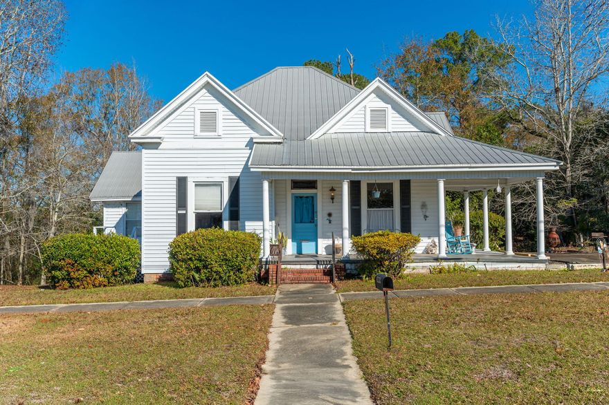An opportunity to own a Historic Home over 100 years old located on 1.38 sloping acres - 6 platted lots in Florala, AL just past the Florida State Line. Features original wood floors, wainscotting, 12 ft ceilings, 2 sets of pocket doors, 4 fireplaces with mantels (closed), original windows and much more. Kitchen has been recently updated, Previous owner updated home in 2002 with new electrical, 2009 replaced roof. Zoning is mixed use  - perfect for personal residence, home business or professional office. Plenty of space to build a second home or business. Walking distance to Lake Jackson.  PROPERTY IS BEING SOLD AS-IS. Current termite bond with Andalusia Termite and Pest Control that is assumable. Some furnishings will remain with home. Property is leased through January 2026