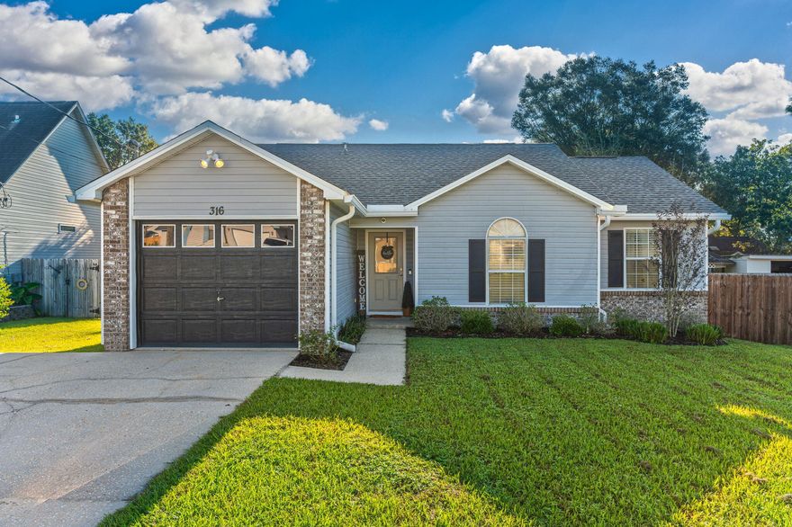 Great home in South Crestview! Brand new roof July 2022, new hot water heater January 2022. The rest of this move-in ready home was completely renovated in 2016. Laminate wood flooring in all main areas. 12x24 tile in bathrooms. Master suite features a barn door to the bathroom and tiled shower/tub. All new lighting installed as well. Back yard is fully fenced. Walk out onto a large deck area and enjoy peaceful nights outside by the grill! New carpet in bedrooms to be installed prior to closing.