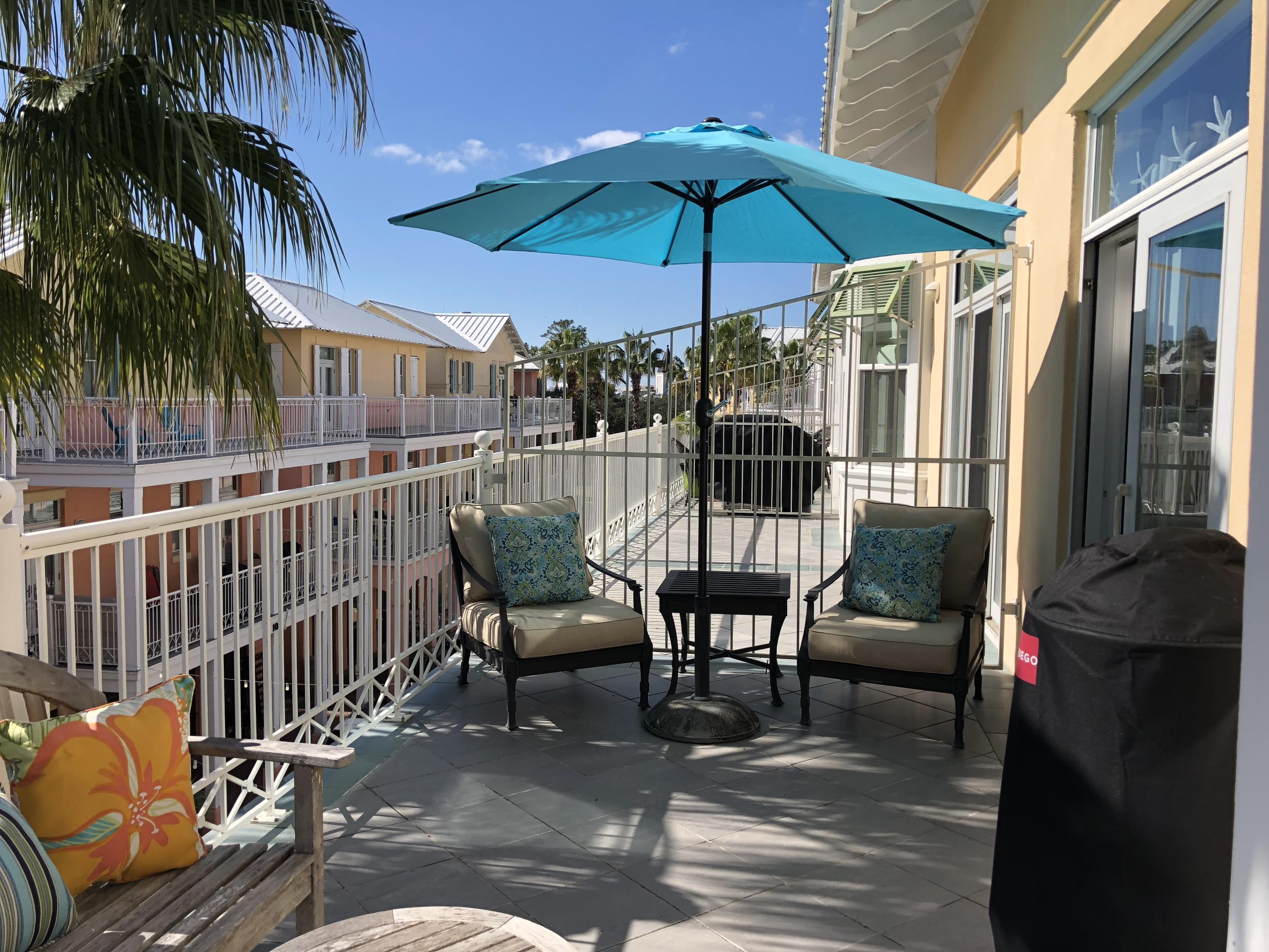This well designed and beautifully decorated one bedroom condo in the Downtown area of Carillon Beach will not last! There is an open Living and Dining Room Floor plan with easy access to the kitchen, a half bath and a spacious balcony with views of Lake Carillon that make up the first floor. On the second floor, you will find a huge master bedroom and master bathroom with lake and gulf views! There is a new water heater, garbage disposal, gas grill and other amenities including 2 years remaining on a 3 year Peaden HVAC and plumbing transferable contract, custom draperies and shades, sofa/sleeper, day bed and electronic deadbolt door lock. There is also a golf cart being sold with the unit for you to use to enjoy all of the amenities at Carillon Beach!
