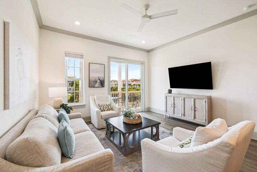 This fully furnished 3-bedroom, 2-bathroom condo spans 1,135 sq ft and is ideally located on the second floor of this boutique 19-unit development on the west end of Scenic Highway 30A.Inside, enjoy 10-foot ceilings, Mohawk LVP flooring throughout, and an open floor plan that feels bright and inviting thanks to large windows and full-height sliding glass doors. The modern kitchen features Shaker-style cabinetry, quartz countertops, subway tile backsplash, a stainless steel farmhouse sink, and newer appliances. A generous island with seating for four flows into the dining area and living room -- the perfect setup for entertaining. Step outside to your covered balcony overlooking the pond and fountain, with peekaboo Gulf of Mexico views  an ideal spot for morning coffee or sunset cocktails. The spacious primary suite boasts balcony access and an ensuite bath with walk-in shower. A bunk room with four built-in bunks plus a guest bedroom make this condo comfortably sleep the whole family.

Built in 2020, Azure at 30A offers a resort-style heated pool and hot tub, along with open parking for two vehicles. HOA fees include insurance, internet, trash, and water, keeping ownership simple and worry-free.

Just a 5-minute walk to two beach access points at the south end of Martha's Lane and a short bike ride to Stinky's Fish Camp, Gulf Place (with Shunk Gulley, Perfect Pig, shopping, and events), plus Topsail Hill Preserve State Park and Point Washington State Forest for outdoor adventures. Whether you're seeking a vacation rental, second home, or full-time residence, this unit checks every box.