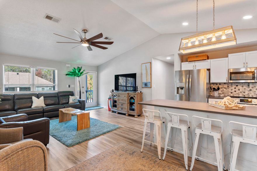 Amazing value for fully renovated 3-bedroom coastal cottage in North Santa Rosa Beach close to Choctawhatchee Bay, Hogtown Bayou and just 4 miles from the beach and Gulf of Mexico. This is an expansive lot over 1/4 acre (0.29 acres) with plenty of room for a pool. Enjoy the fully fenced yard for privacy, outdoor fire pit and serenity with the surrounding trees. There is boat & beach gear storage under the home and room for outdoor activities, as this is a piling house. Entire home has been renovated with newly painted exterior, metal roof, new flooring, kitchens and bathrooms. This is an ideal primary investment, second home or great for short term rentals bringing in $35k annually. The wraparound balcony is ideal for outdoor dining and entertainment. Interior finishes are top notch!