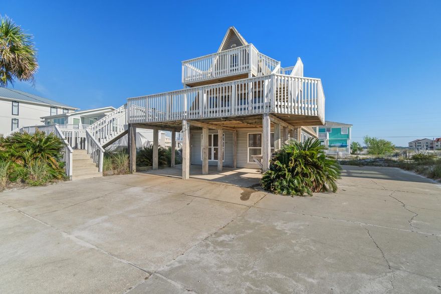 *** PENDING CONTRACT WITH KICK OUT CLAUSE ONLY FOR INSPECTION PERIOD***

Welcome to the most charming beach house on the market!! Gulf water views without the Gulf front price! 
3 stories of rooms, views, deck space, and even a spiral staircase going to the 3rd floor (which is fun for kids) There is 3 full bedrooms and the 3rd floor has the bonus 4th room and play area. 
Over a quarter acre of property with a carport, beach sand and super long drive way attached to sidewalks. Enjoy riding bikes, walking across to the gulf beaches, or walking your pets safely in this area. The living room and 3rd floor has crystal clear views of the Gulf. The public parking area is catty corner from this A frame home so if you rent it out, this is PERFECT for them! welcome to your very own beach home!!