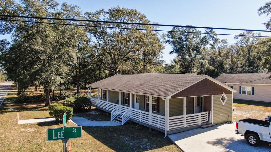 At only 5 years old, this well maintained, easy maintenance, vinyl siding home is located in the city limits, only a 1/2 mile to Lake DeFuniak and downtown. Fabulous front porch spans the width of the entire home, welcoming you and your guests in style. Open floorplan with nearly new luxury vinyl plank in common areas. The kitchen is open with a large island, perfect for gathering around. Large utility room off the porch is a great spot to drop your shoes before entering the kitchen to drop the groceries! Appx .22 ac lot that isn't too large to manage, but large enough to enjoy. Take advantage of low interest rates and newer construction, which also means lower homeowners insurance!