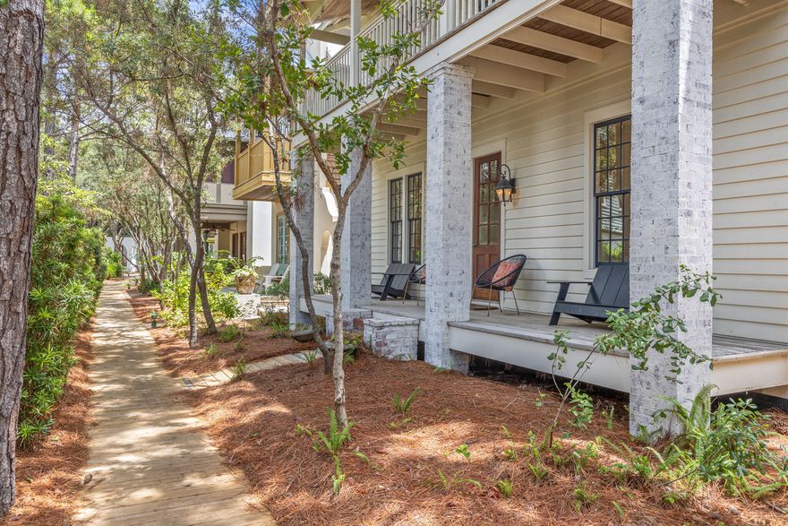 This exquisitely charming cottage nestled in the idyllic and highly desirable Coastal Community of Rosemary Beach offers 3 bedrooms and 3 baths and two separate living areas. This lovely property is situated on a tree-lined Boardwalk , mere steps from the vibrant town center and just minutes to the pristine beach. The French door courtyard entryway invites you into a tranquil haven, adorned with soothing earth tones and beautiful oak floors. The comfortable seating area is perfect for unwinding after a day of enjoying the beach.This delightful parkside cottage boasts a chef-style kitchen, thoughtfully designed with ample pantry storage, island seating for four, and a spacious dining area, all seamlessly integrated into the open floor plan. The first floor also features an additional