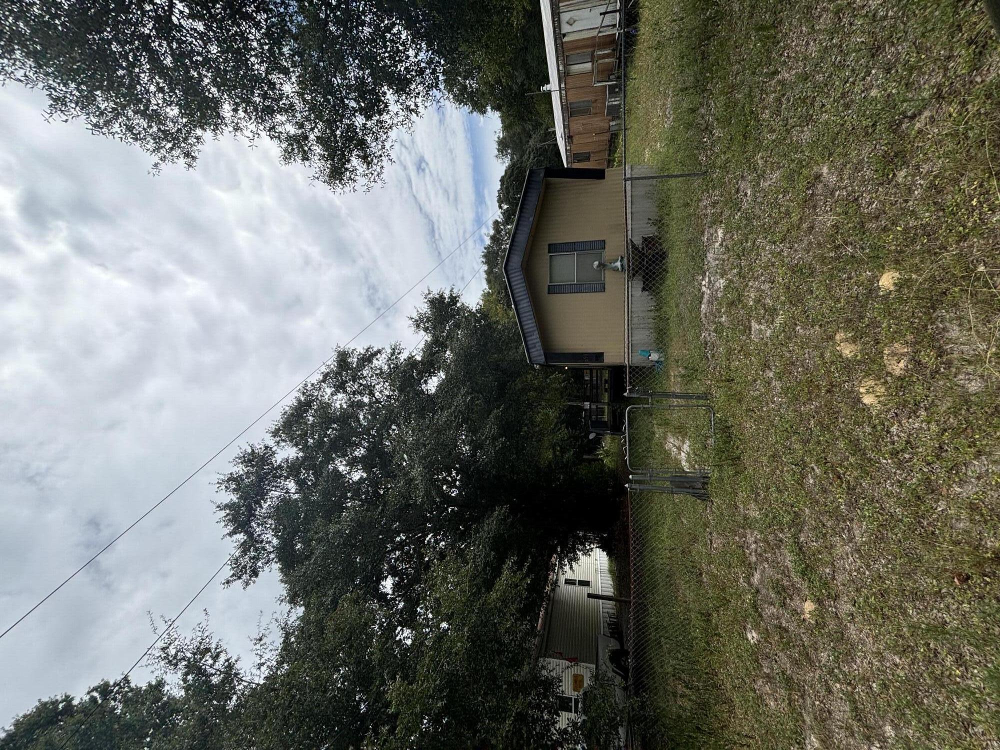 Enjoy the sunset after a long day. This property is within walking distance of Choctawhatchee Bay! Located between Blue Water Bay and Freeport. Lot is 50 feet wide and 150 deep. Endless possibilities and potential for this property. Please note property is selling AS IS (lot and mobile home)Manufactured/Mobile home has 3 bedrooms, 2 bath. 72ft X 16ft