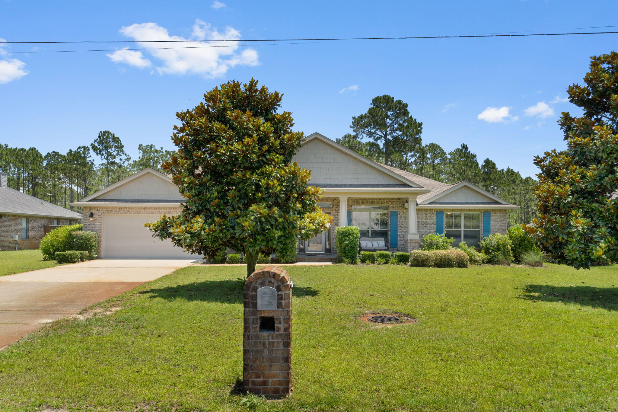 MOVE-IN READY, Craftsman style, brick home situated on a .49 acre lot, built in 2010 with a GREAT OPEN FLOOR PLAN that features 2677 sq.ft, 4 bedrooms, 2&1/2 baths, spacious great room with 10' ceilings, a corner fireplace and opens to a large covered porch. The kitchen is oversized with lots of maple cabinets, an island, granite countertops, undermount sink, hop up breakfast bar, stainless steel appliances and a generous size pantry.   The large laundry room is located off the kitchen and has a service door to the backyard. The formal dining room is currently being used as a 2nd living area and the 4th bedroom is currently being used as an office. The master bedroom features a trey ceiling, with fan and a door to access the covered porch. The master bath has double vanity, garden tub,