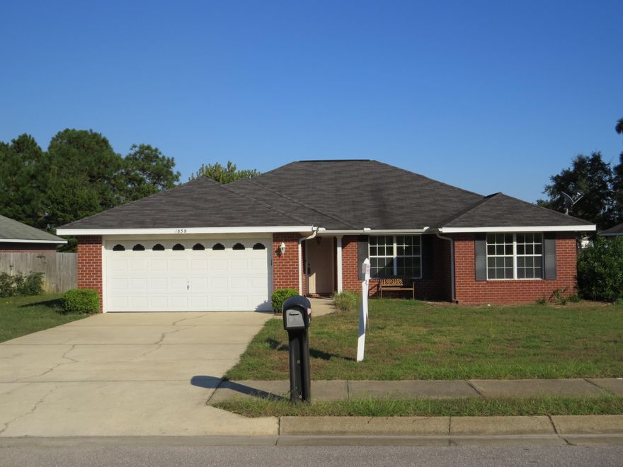 Here is a well-cared for 4 Bed/2 Bath home in Lighthouse Point. ALL BRICK home that sits on one of the largest lots in Lighthouse Pointe. Major renovation completed last year. Upgrades included: GRANITE countertops, solid wood cabinetry, NEW appliance suite (refrigerator, microwave, dishwasher, oven), OIL-RUBBED BRONZE light fixtures (overhead, pendant, and dining areas), WOOD-LOOK ceramic tile in kitchen and dining area. Spanish lace finish on ceilings. New carpet and pad, FRESH neutral paint throughout along with 5 new ceiling fans. Lighthouse Pointe is an idyllic sound-front neighborhood with community pier, playgrounds, and covered picnic areas on the water.