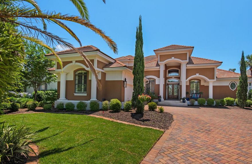 Welcome home to this gorgeous Mediterranean home nestled on the 15th green of Regatta Bay's impressive 18-hole golf course. It boasts a recent $100,000 kitchen renovation featuring quartz countertops with up-lighting, new cabinets, new stainless Wolf gourmet appliances, a Subzero refrigerator, sink, faucets, fixtures, and more. The soaring 22' ceilings in both the living and family rooms create expansive energy with plenty of sunshine, crown molding, and recessed lighting.The private master suite enjoys double french doors leading to the private pool and lanai with a summer kitchen and spa, as well as double walk-in closets, a luxurious jetted soaking tub, a spacious shower with dual shower heads, and a double sink vanity.