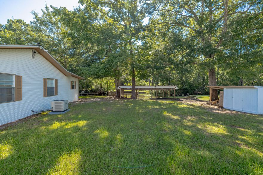 MAJOR PRICE IMPROVEMENT!!  Waterfront Living at Its Finest! Nestled in Bunker Creek, this Southern-style retreat sits on .21 acres with 125 feet of waterfront along a 20' wide, 4' deep canal. Enjoy boating and fishing with 3 covered boat slips, a sea wall, and quick access to Choctawhatchee Bay, the intracoastal, and Crab Island. Inside, the 2BR/2BA layout features a bright kitchen, cozy fireplace room, and screened porch perfect for sunsets. Whether a full-time home or weekend getaway, this peaceful slice of paradise blends comfort, charm, and outdoor adventure. The river and bay are calling--don't miss it!