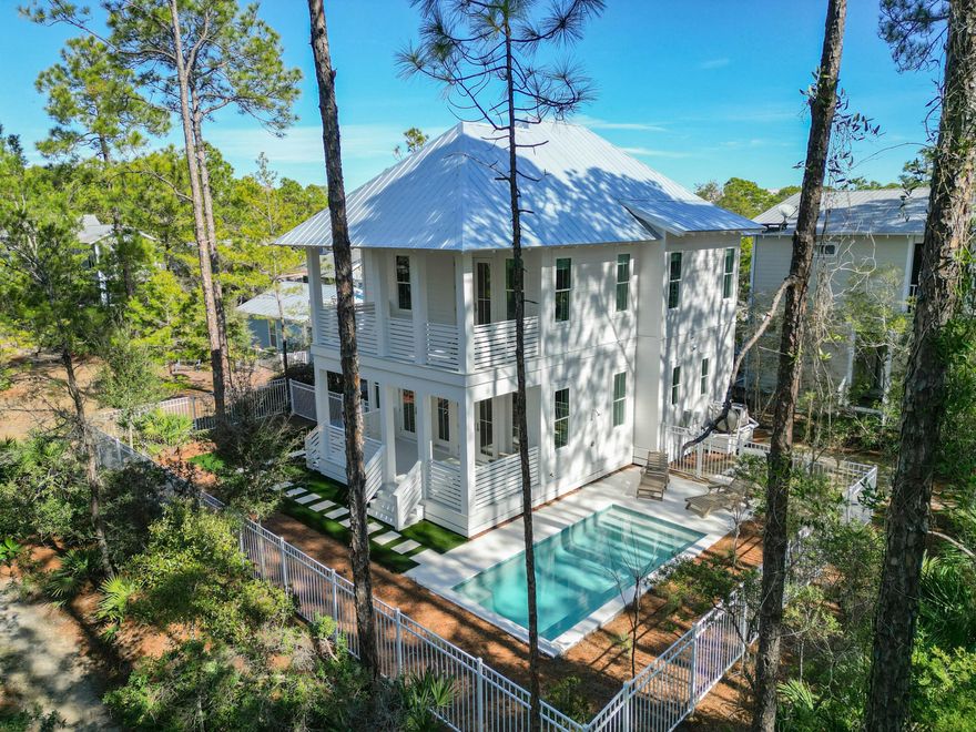 Discover this exquisite 4-bedroom, 2.5-bath gem nestled in the serene and sought-after community of Grove By The Sea. A rare find, this brand-new construction stands out amidst charming homes 20-30 years old, offering a modern touch just a 4-minute stroll from the pristine beach.Enjoy the ultimate in comfort and convenience with fully furnished interiors, making your transition seamless. The property boasts a 9'x20' heated private pool--an exclusive luxury in the neighborhood--perfect for relaxing after a day of sun and sand. Mature landscaping surrounds you, with walking trails, tennis courts, and pickleball enhancing your lifestyle.With projected rental revenue up to $139K annually, this is an ideal way to offset the cost of a 2nd home!