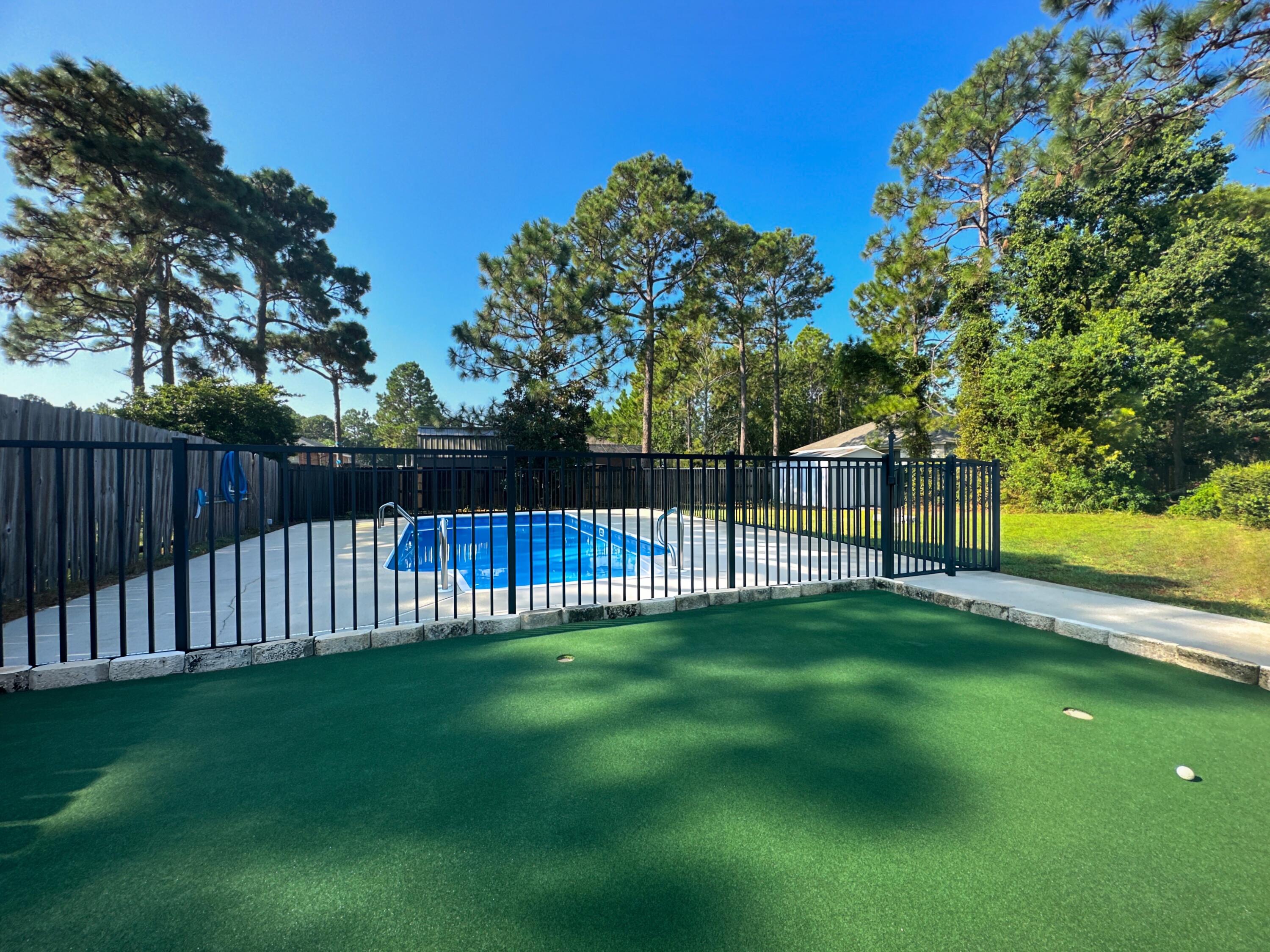 This Hidden Creek Pool home is NOW AVAILABLE! The sellers have UPDATED the systems for you; making this home hassle free and move in ready! Entering through the front door you are greeted by the formal dining and living rooms, which could also serve as an office/playroom or 5th guest room. The Great Room open floor plan layout transitions easily into the heated/cooled sunroom with extra wide sliding doors; leading to the expansive backyard (.46 acres), complete with pool, firepit and 3 Hole Putting Green! The split 4 bedroom/3 bath layout allows for a separate guest/In-Law suite with private bath and entrance. Additional private boat/RV parking is located behind double side gate. *Seller offering carpeting allowance at closing* CALL TODAY TO SCHEDULE YOUR TOUR!