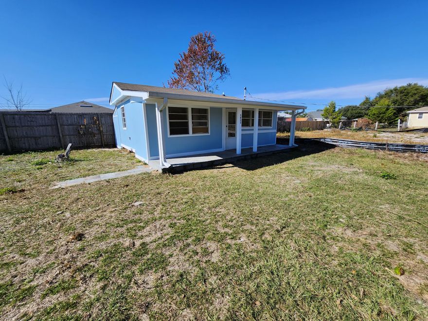This charming 1 bedroom cottage would make a great investment property or a home base for an avid RV traveler. It would also be the perfect place to store your boat and RV with no HOA restrictions. Recent updates you will enjoy include kitchen backsplash and countertops, new mini-split air conditioning, new tub and floor-to-ceiling tile surround, and a fresh coat of paint inside and out! The entire lot is fenced and it offers a large laundry room with a spacious living area and a bonus room on the back side of the house that would make a great additional bedroom, home office or storage room. It is located 9 miles to beautiful Navarre Beach and also in the Santa Rosa County School District. Check out our full video tour on the MLS and YouTube.