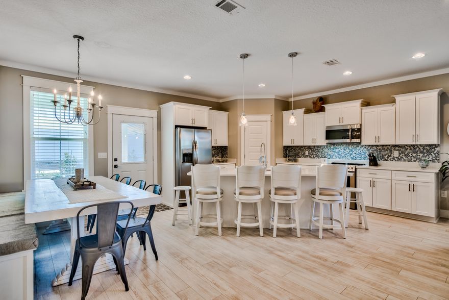 Back on the market!This 2 year old home ideally located in the gated community of Cypress Breeze Plantation which features the largest resort style private community pool (13,000 sq. ft) in South Walton. Live the 30A lifestyle with an easy bike ride, golf cart ride or leisurely walk to the beach and the Gulf of Mexico.This 5-bedroom, 3-bathroom home is perfect for primary, secondary or vacation rental investment opportunity with a projected gross rental income of $95K annually. Walking into the open floor plan, you will immediately notice the 9' entrance and 10' tray ceiling in the living room. Other notable features of this home are the master on the first floor, also with a 10' tray ceiling, and two additional bedrooms downstairs. The second-floor