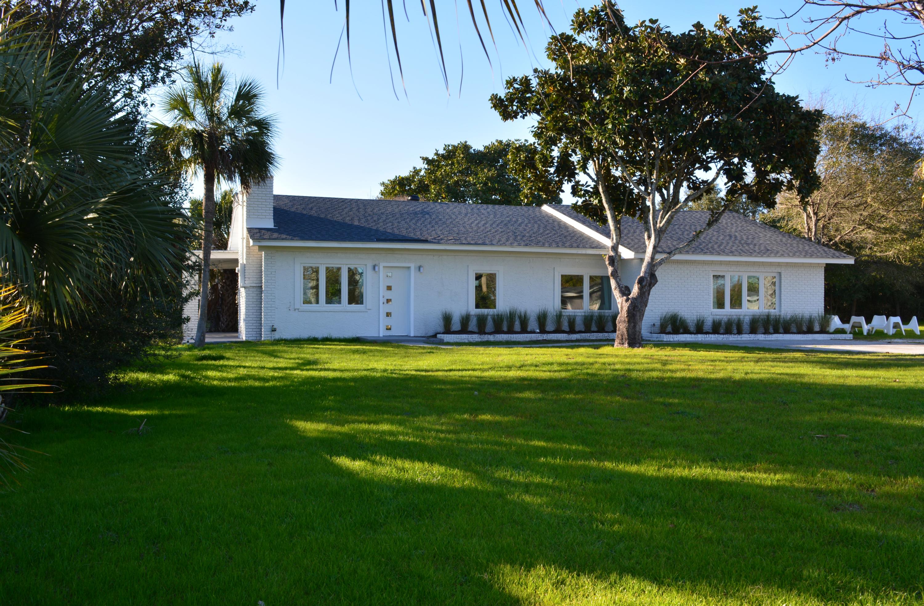 Be the first spend the night in this newly remodeled charming Old Florida cottage since its recent major makeover. 3 Bedroom, 3 Bath with large bunk area that could easily be made into 4th bedroom. Sold furnished. Appox 2800 sf but owner is to verify such or accept actual sf'age as part of the offer. Recently remodeled. New Kitchen, interior and exterior paint, furniture, landscaping and AC. NEW ROOF IN 2015 WITH LIFETIME WARRANTY! Large open living area with fireplace PLUS a den. GREAT OLD FLORIDA COTTAGE FEEL. Large lot. 600ft walking distance to the sand! And you can see the beach from your driveway Public access at end of st.