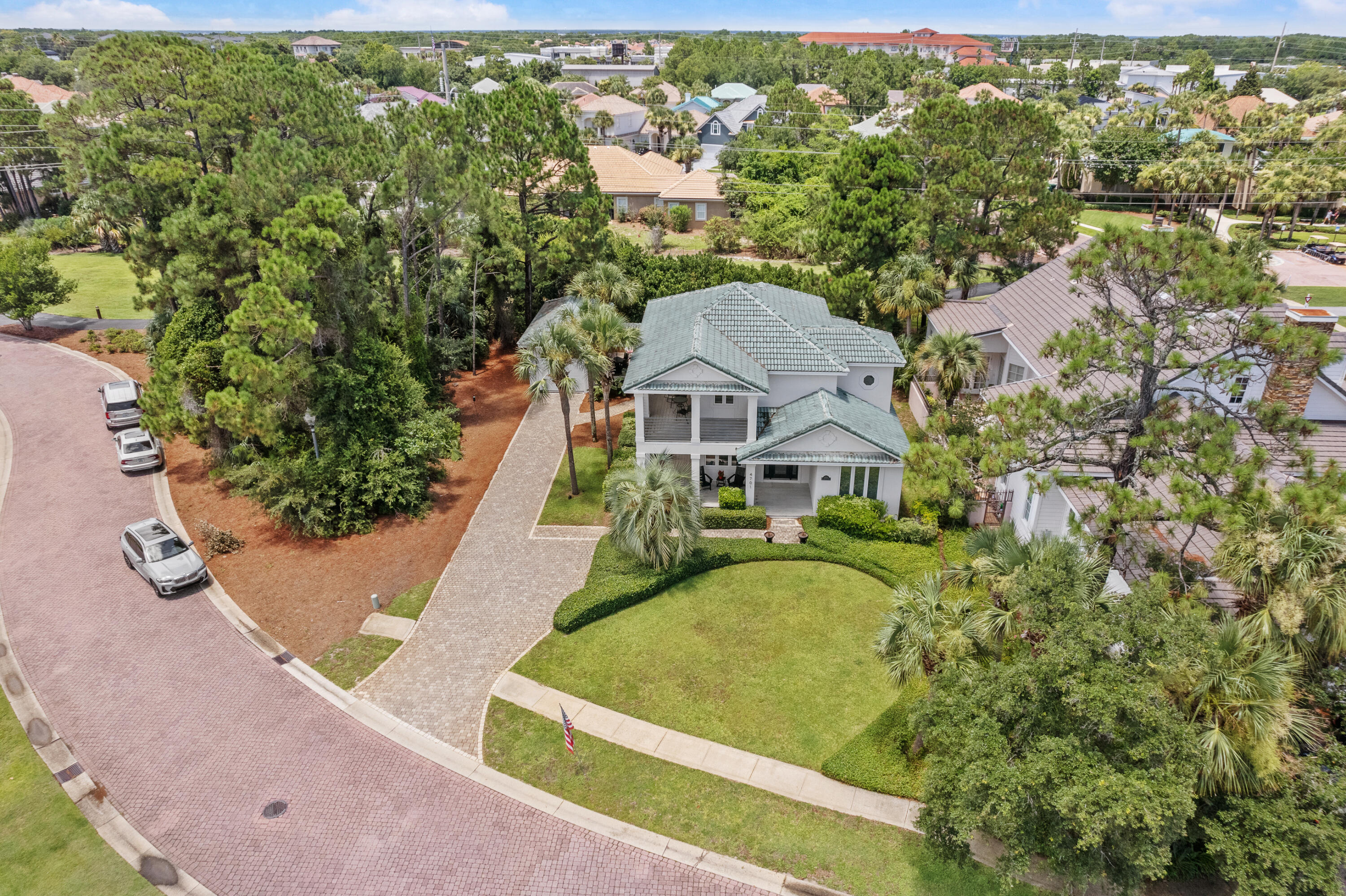 DESTINY EAST beach community! Most sought after community in Destin! Great Home, Vacation home or investment property. This home is loved and very well maintained. A lot of living space for your entire family. Nestled in beautiful green foliage and the most private home in the neighborhood. This home boast 4 bedrooms with large baths and dressing areas. The outside living is impeccable with main level porch with TV area and the balcony on the 2nd floor raps from across the front around to the west side with views of Four Prong Lake. Patio area between the home and separate garage. Come see this home, it will not last long.