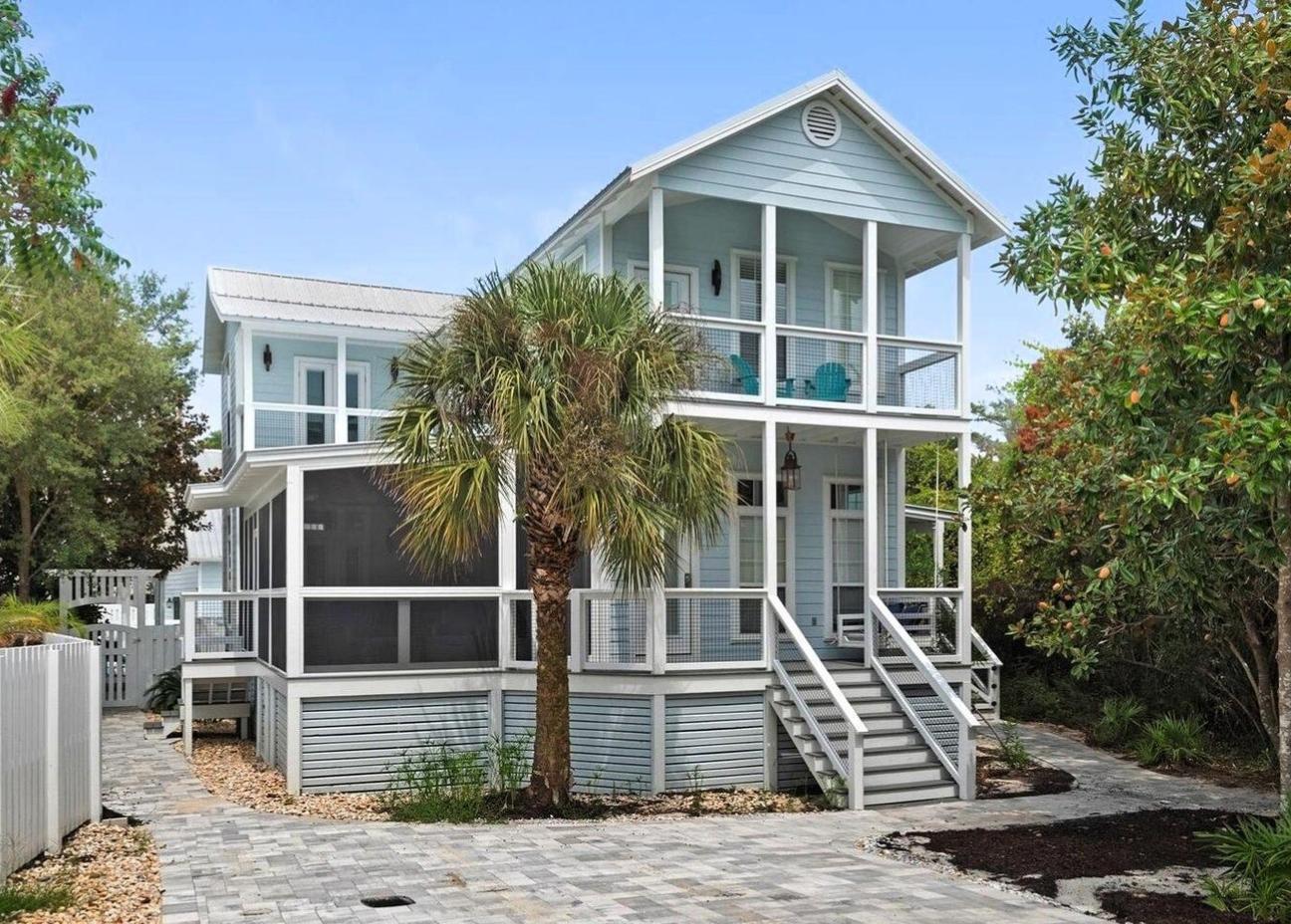 What a great location centered in heart of Seagrove Beach!  The home offers treed privacy on the east side of the lot. It offers easy walking access to the Eastern Lake beach access where you will find white sand beaches and emerald green waters of the Gulf of Mexico.  The main home has 4 spacious bedrooms and 4 baths.  The carriage house offers 3 bedrooms, 3 baths and a full kitchen and living area.  There are multiple shaded porches for relaxing and just being lazy.   The size of the home makes it a very desirable rental for large multi-generational families.  You will enjoy the gorgeous pool and hot tub which is located between the main house and the guest house.   The carriage house has its own driveway and parking offering ample parking for all.  This information is deemed reliable but should be verified by the buyer.