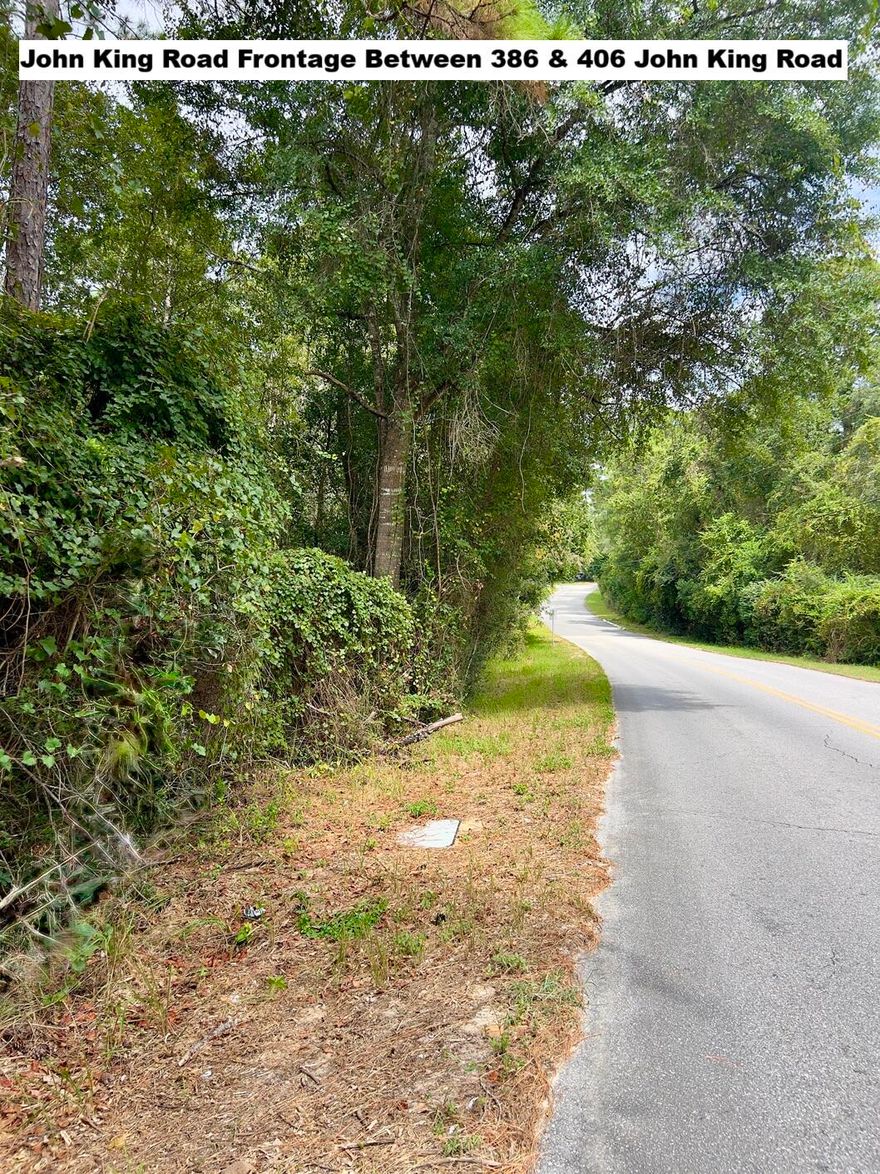SOUTH OF I-10 IN CRESTVIEW, THIS IS A RARE FIND! 22.24 Acres South of I-10. CHECK OUT THE PHOTOS. Paved Road Frontage to include the following locations between 356 & 358 John King Road, between 386 & 406 John King Rd. This is vacant land. The seller has never occupied the property. There are no property disclosures. The buyer is responsible to satisfy themselves with any information they deem important. The due diligence period should be completed within 30 days.