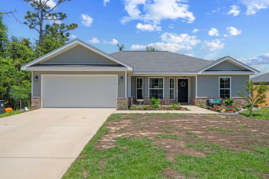 Welcome to 1955 Pentagon Street in Gulf Breeze! Built in 2020, this 3-bedroom, 2-bathroom home offers 1,428 square feet of well-designed living space. The open-concept floor plan connects the spacious living room, dining area, and kitchen--ideal for both everyday living and entertaining. Luxury vinyl plank flooring flows through the main living areas, offering durability and style, while plush carpet in the bedrooms adds comfort and warmth.The kitchen features modern appliances and ample cabinet space, making meal prep a breeze. The primary suite includes a private en-suite bath, and two additional bedrooms provide flexibility for guests, family, or a home office. Step outside to enjoy the newly added screened-in porch--perfect for relaxing evenings or morning coffee without the bugs. The backyard offers room to garden, play, or entertain, and the attached 2-car garage adds convenience and storage. Located just a short distance from schools, shopping, and the white-sand beaches of the Gulf Coast, this move-in ready home blends modern touches with everyday comfort.