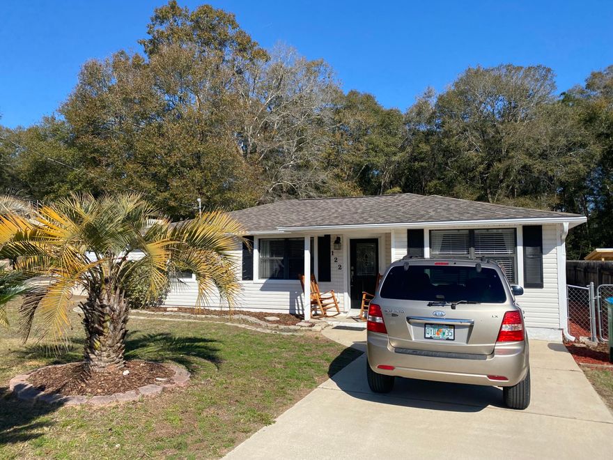 NOW WITH A BRAND NEW ROOF! This charming 3 bedroom, 3 full bath home is centrally located in Crestview. Ample parking as home has two double car width driveways, fenced backyard with large 20x20 workshop. As you enter the home you arrive in a large open floor plan with eat in area, kitchen with newer appliances and floating island, all solid surface countertops in kitchen. Split floor plans with master, additional bedroom and full bath on one side, and 2nd master style suite on the opposite side of the home. Laminate flooring and tile in the main areas and carpet in the bedrooms. Both in-suites are large sizes to accommodate all furniture styles.