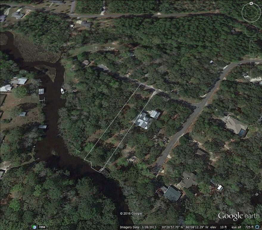 Beautiful waterfront lot with access directly to the bay. If you are searching for a waterfront lot to build your dream home this is the one. Partial cleared and ready for building. The lot is over .68 acres and has over 77 feet of waterfront. The lot has large canopy oaks and plenty of room for all you've been wanting. The property is located on a paved road and near the beaches.