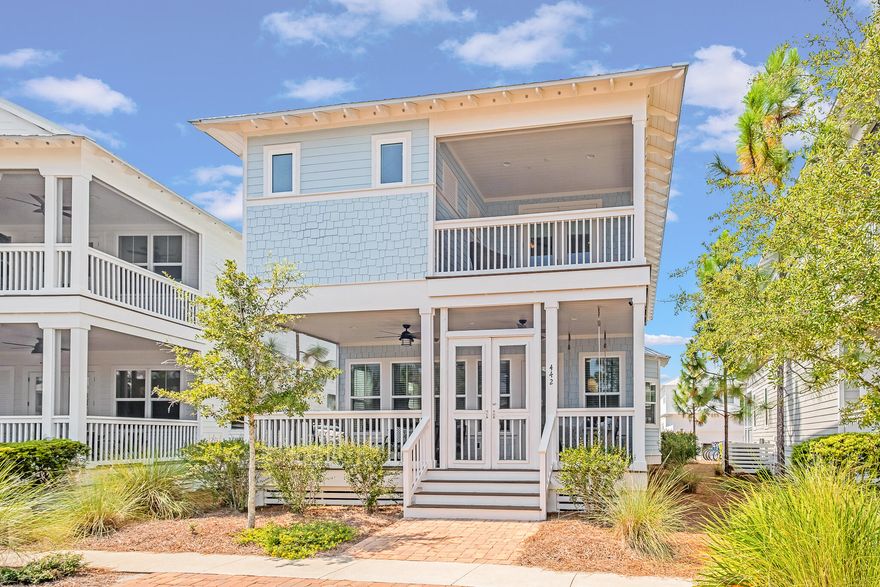 Welcome to your fully furnished, turnkey 4-bedroom home in the sought-after NatureWalk at Seagrove community. This is the best-priced 4 bedroom with a rare 1 car garage in the area! You'll love the dual primary suites, one of which is conveniently located on the first floor. The home is just a few doors down from the pickleball courts and a swing set and green area, making it the perfect location for families.This home has a proven track record of success with $72,000 in rental income. Relax and take in the scenery on one of two porches, with the first-floor porch offering a porch swing for those lazy days. The spacious and bright living room features wall-to-wall windows that open to the kitchen and dining area.