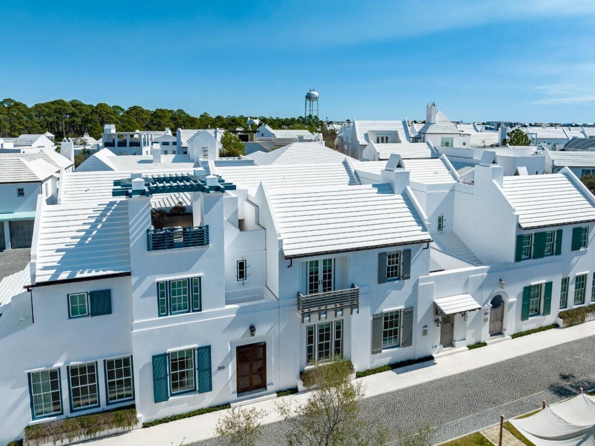 190 North Charles Street is a beautiful 4 bedroom, 4.5 bath Alys Beach home designed by Eric Watson that embodies the best of Alys Beach living. Overlooking Papilio Park, the entry Zaguan leads to a private courtyard with plunge pool, covered loggia area and outdoor summer kitchen. First and second floor master bedrooms and a two car garage make this home ideal for full-time living or longer vacation stays. High end appliances and custom finishes are found throughout. This home was completed by Alys Beach Construction in 2019.