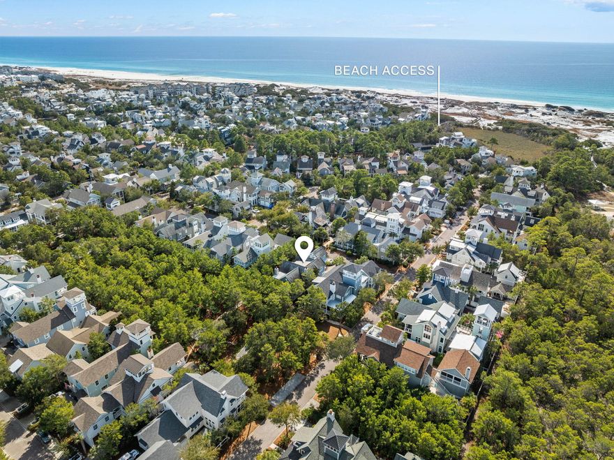 Nestled in the heart of Watersound Beach, this stunning custom-built home skillfully designed by T.S. Adams & masterfully executed by Cole Construction offers an unparalleled blend of luxury, craftsmanship, and tranquility. Boasting 4,082 square feet of thoughtfully designed living space, this residence is perfectly positioned for ultimate privacy, backing up to a serene park that enhances its peaceful ambiance. Designed for seamless indoor-outdoor living, the home features over 1,000 square feet of porches and outdoor living areas, perfect for entertaining or enjoying the gentle coastal breezes. The incredible floor plan allows for effortless first-floor living, with a spacious primary suite conveniently located on the main level, providing a peaceful retreat. The main house exudes Southern charm with its impeccable architectural details, high-end finishes, and a floor plan that balances open-concept gathering spaces with intimate retreats. Both indoor and outdoor fireplaces create inviting spaces for relaxation and entertaining, adding warmth and character to the home. A beautifully appointed carriage house with a full bath provides privacy for guests with access to their own separate living space, while the detached two-car garage offers ample storage for beach gear, golf carts, and more. Located in the prestigious gated community of Watersound Beach, this home is just steps from the sugar-white sands and crystal-clear waters of the Gulf, as well as the community's array of resort-style amenities, including pools, boardwalks, and scenic trails. Don't miss this rare opportunity to own a one-of-a-kind coastal retreat in one of 30A's most sought-after neighborhoods!