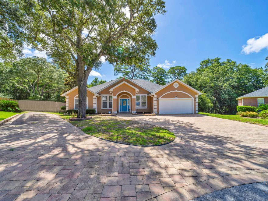 LUXURIOUS FLORIDA LIVING AT ITS BEST. Stunning, custom Home w/caged gunite pool & NEW ROOF on large, private .34 acre lot in Rocky  Bayou. Quality construction w/10-13 ft tray ceilings w/ crown molding, 2 living areas, separate office & fantastic floor plan w/MasterBR wing, 2nd wing w/2 BR's & 2nd bath, & 3rd wing w/4th BR & 3rd bath. The formal Dining rm sets the stage for intimate gatherings while the living area provides a setting for relaxation. Ensuring both Luxury & functionality, the gorgeous kitchen w/custom cabinets, SS appliances, gas stove, granite counters & large eating bar flows effortlessly into the family rm.  Complete w/large custom bar & TV area, this fantastic space is ideal for entertaining friends while cheering on your favorite sports team. Large, sliding doors from the family rm/bar area create a seamless flow between indoor and outdoor serenity onto the spacious 384 SF covered lanai.  With an outdoor kitchen, dining area & outdoor living area w/gas fireplace,  this beautiful home's backyard oasis provides the ideal space to host summer BBQ's, pool parties & truly embrace the Florida lifestyle.  Stay cool & refreshed on a hot day relaxing in your large, caged, gunite pool.  The giant backyard provides privacy and plenty of room for relaxation or play. Other features include quiet, end of the cul-de-sac location, front yard sprinkler system and exterior yard shed.  A secondary driveway with access to parking in the backyard allows for easy storage of an additional vehicle, RV or boat.  A new roof provides peace of mind & affordable insurance. Located in the heart of Rocky Bayou in Huntington Sub/div w/LOW $168/year fees, this stunning home is close to schools, shopping and both bases. Start living the luxurious Florida lifestyle you've always dreamed of.