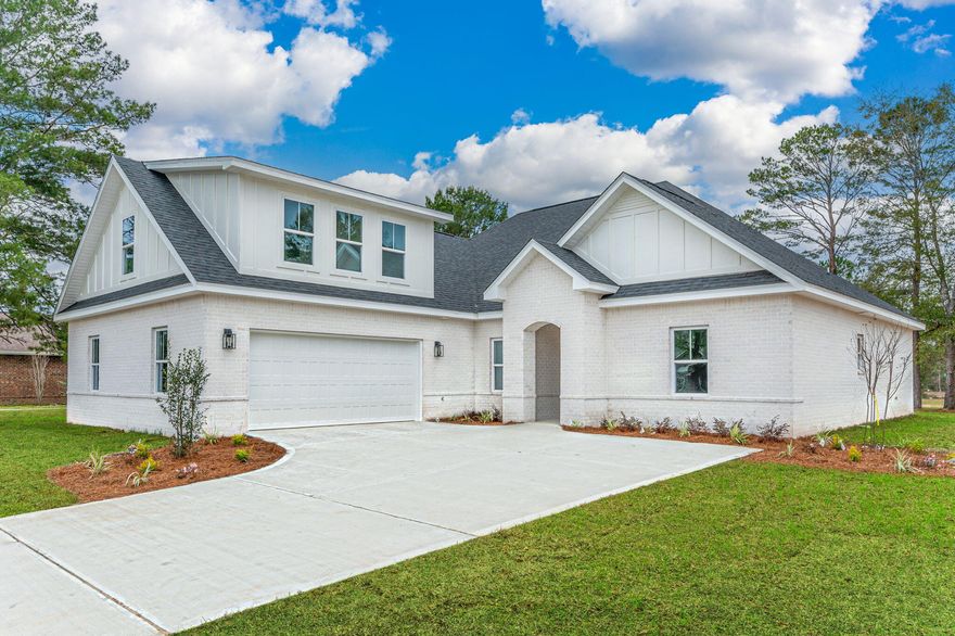 GORGEOUS CUSTOM HOME offered with all of the upgrades you could want! This 4 Bed 3 Bath home, with a huge 700 square foot garage  HOMEWOOD ESTATES! This home offers a wonderful open floor plan, living and kitchen space, with wonderful sized bedrooms. The natural light in this home is incredible with tons of windows. There are quartz counter tops throughout with custom cabinetry.  The home has covered front and back porches and an automated sprinkler system.