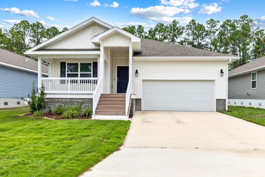 Welcome to Indian Cove community located just blocks from the Bay and minutes from the pristine beaches of the Emerald Coast. This spacious open floor plan features 4 bedrooms, 2 bathrooms, and a  2 car garage. The home is complete with white cabinetry throughout, kitchen island, stainless steel appliances, gutters around the whole exterior, beautiful luxury vinyl in all the main areas of the home and carpet in the bedrooms. This home also includes a smart package equipped with a KwikSet keyless door locks, Skybell doorbell and Qolsys touch panel. The newly built outdoor deck provides the perfect blend of indoor/outdoor living along with amazing entertainment space for barbeques and family gatherings.