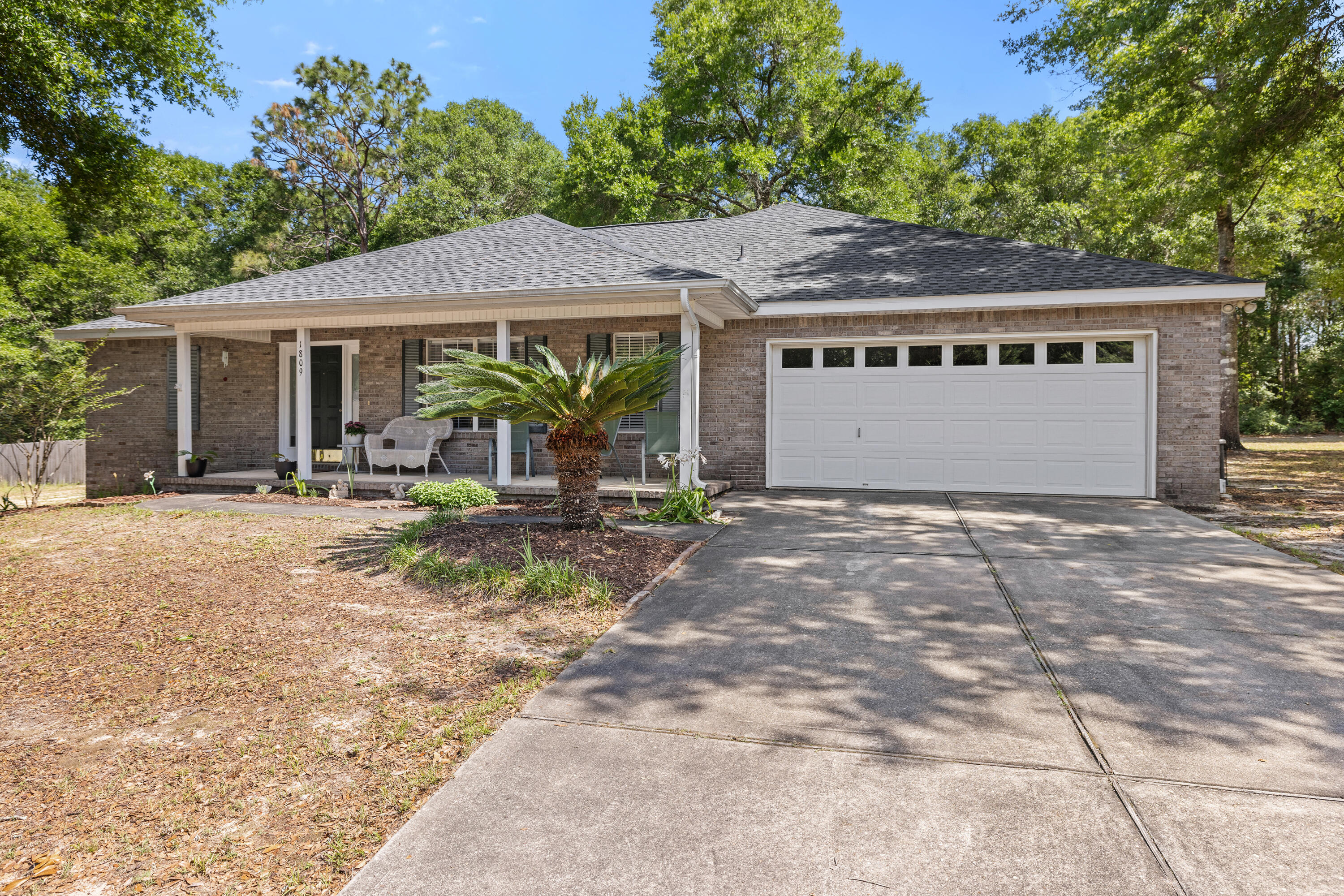 Your dream home awaits you located on a 1 acre lot. Wake up to this beautiful home in the country with an open floor plan and lots of natural sunlight and ample space for entertaining and unwinding. As you enter you will notice the formal dining room that would also make a great office or playroom. The kitchen features a breakfast bar and cozy eat-in area for casual meals. The spacious family room retreat has a cozy wood-burning fireplace while the Master Suite with tray ceiling is tucked away in your private sanctuary. The master bathroom features a garden tub, separate shower, private water closet, double vanity and a large walk in closet. The thoughtful layout offers 2 additional bedrooms and a guest bath on the opposite side of the home, ensuring privacy for all.