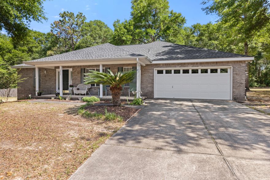 Your dream home awaits you located on a 1 acre lot. Wake up to this beautiful home in the country with an open floor plan and lots of natural sunlight and ample space for entertaining and unwinding. As you enter you will notice the formal dining room that would also make a great office or playroom. The kitchen features a breakfast bar and cozy eat-in area for casual meals. The spacious family room retreat has a cozy wood-burning fireplace while the Master Suite with tray ceiling is tucked away in your private sanctuary. The master bathroom features a garden tub, separate shower, private water closet, double vanity and a large walk in closet. The thoughtful layout offers 2 additional bedrooms  and a guest bath on the opposite side of the home, ensuring privacy for all.