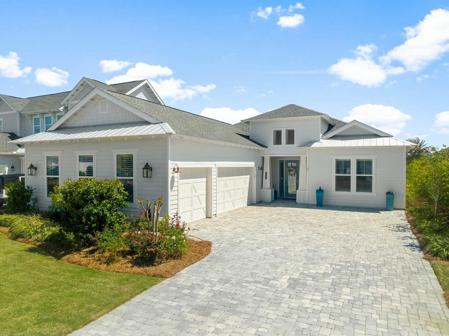 Located in the exclusive gated community of Watersound Naturewalk, this beautifully upgraded single-level home offers luxurious living with 10-foot ceilings, hardwood floors, shiplap accent walls, and custom finishes throughout. The open-concept design features a gourmet kitchen with a gas stovetop, wine fridge, oversized island, and pantry, flowing seamlessly into the spacious living area.Enjoy the outdoors in your private porch with automatic privacy screens, heated saltwater pool, spa, and firepit -- the perfect spot for grilling, relaxing, or watching a game. The primary suite includes a large ensuite with a walk-in shower, soaking tub, and direct access to the pool. Two additional guest rooms, one with an ensuite, provide ample space for family or visitors. The fourth bedroom is currently used as a home office.
Other highlights include custom window treatments, a 3-car garage with attic storage, and a bright laundry room with ample storage. All rooms come with televisions for added convenience.
Enjoy access to golf, pickleball, tennis, community gym, and nature paths within the community. A short bike ride to Alys Beach and Rosemary Beach, with shops, restaurants, and a farmers market nearby. 