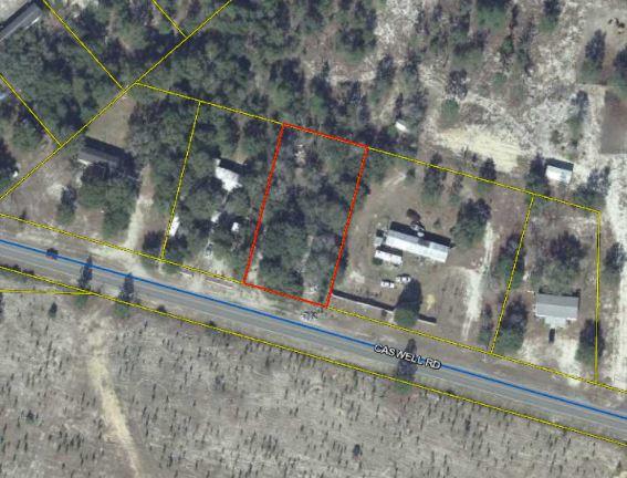 TIME TO BUILD!Check out this half acre lot in Defuniak Springs. Perfect combination of Convenience and Country Living! 5 minutes away from Downtown Defuniak Springs and still just 45 minutes to the beautiful white sands beaches south of the bay!This lot has a mobile home on it but is unsalvageable. With that said, this lot has utility hookups available.Build 1 huge home on it, or subdivide it into 2 and build 2 houses!