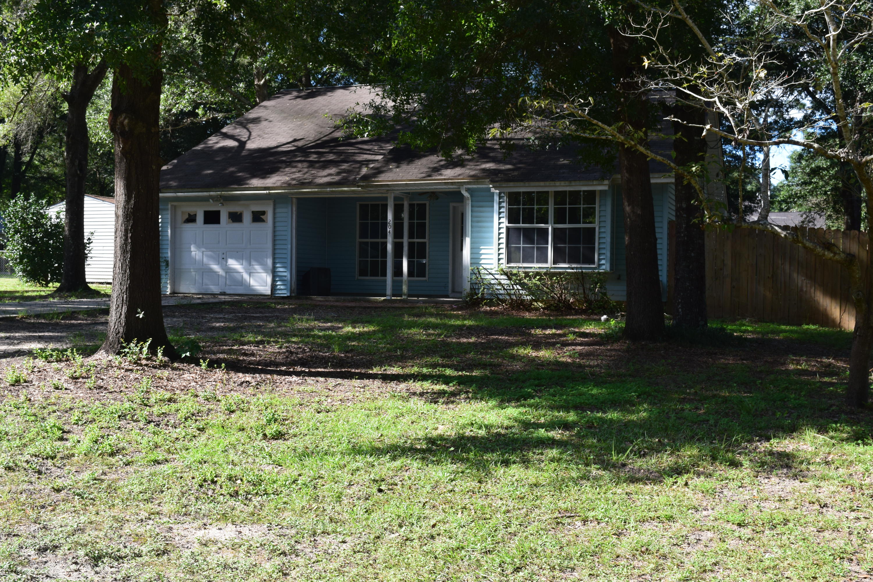 This house just needs a little TLC. It has good bones nice size back yard would be great for a pool add in.