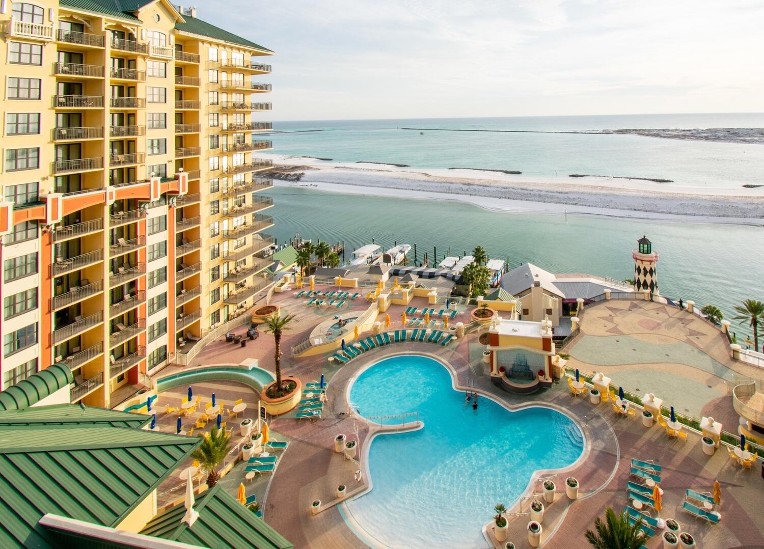 Incredible views with incredible rental income! Emerald Grande W1021 is a beautiful 2 bedroom (plus a full bunk room), 2 bathroom condo with brand new flooring and furniture in the most sought after resort in Destin. This condo is grossing over $91,000 in a non-covid year with over $40,000 in future reservations on the books for the remainder of this year - rental company will continue accepting reservations. Master bedroom has it's own private balcony and another balcony is located right off the living room where you can see unmatched views of the Destin Harbor, East Pass and Gulf of Mexico. Emerald Grande boasts amenities you can't find anywhere else in town including outdoor zero entry pool, indoor pool, 2 hot tubs, fitness center, onsite spa and restaurant and so much more!! Emerald
