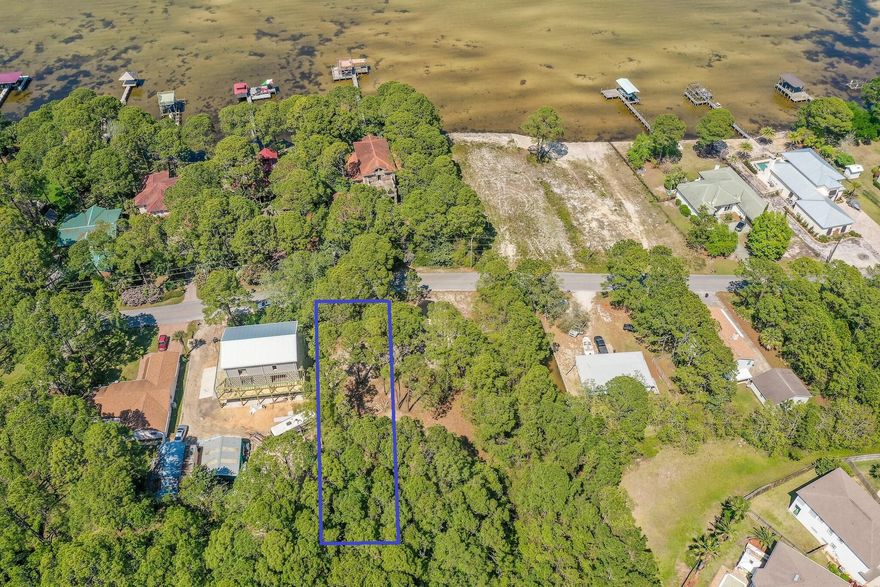 Build Your Dream Home On This Bayview Lot! No HOA Fees!  Need To Build Quick? Save Time & Money By Purchasing Plans Separately. These Plans Are Custom Designed For This Property.  This Lot is Conveniently Located Close to Everything Coastal Living Has to Offer.  Just a Short Walk To Bayfront Legion Park - A Bayfront Park With Public Boat Ramp, Basketball, Volleyball, Playground, Fishing & Picnic Area.   Just Minutes Away From Silver Sands Premium Outlets, Restaurants & The Pristine Beaches Of The Gulf of Mexico.  Start Living That Coastal Lifestyle Just Outside Your Front Door. As Always, Buyer to Verify Square Footage, Dimensions, HOA Fees & Dues.