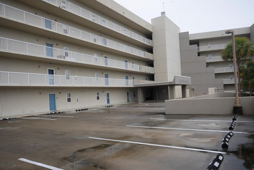 Quite gated-complex on the water with fantastic views. Two bedroom and two full baths and well cared for. Close to beach, shopping, and dining - unit comes with a boat slip and assigned parking space.!