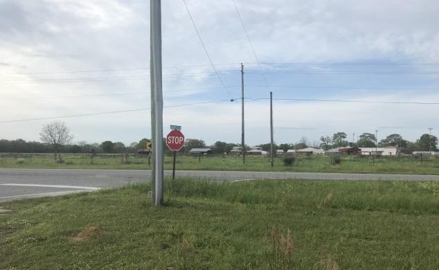 Corner lot in city limits of Paxton located close to 331 next to Ellis Agricultural Field Airport. The property is a great opportunity for growth in the area open to all possibilities with commercial, residential, storage, trucking, 5 miles to Lake Jackson and only minutes to the highest elevation point in Florida Britton Hill. 1 hour from the South Walton Beaches. Great school district. This commercial property consist of a brick building on the corner and work building located directly south of the home. The current zone is 1 acre commercial and over 6 acres residential with a combined lot under one parcel ID. The town is happy to welcome new businesses and potential for this location to rezone to all commercial with this unique opportunity on a corner lot with frontage on Highway 147.