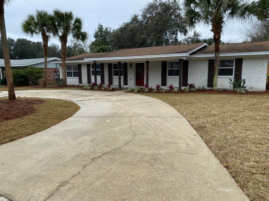 This beautiful remodeled 4 bedroom 2 bath pool home is in a very desirable Niceville neighborhood. The updated style is evident the minute you walk through the new front door and see the all new wood look tile floors in the living areas and brand new carpet in the bedrooms. All new paint throughout, gorgeous new light fixtures and plumbing fixtures. The kitchen has new cabinets with soft close doors and drawers, granite counter tops and all new appliances. The baths look elegant with new vanities and granite countertops. New custom tile in the master shower and around the new tub in the guest bath add a touch of luxury. All the interior doors are new and modern. The exterior has new stucco and german smear finish brick. New sod and landscaping highlight the great yard.