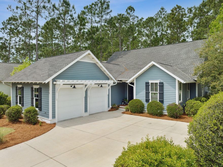 This single-story Watersound Origins Phase 1 charmer features 4 bedrooms, 3 1/2 baths, a bonus office area and a two car garage. The light filled living/dining and kitchen areas flow out to a spacious screened in porch with a fireplace overlooking a fenced yard that leads to a community nature trail. The private backyard has room for a pool. The kitchen features white marble countertops, gas range and a walk in pantry. A built in bar with ice maker off of the living room enhances the open floor plan. The home features ample parking via several extra spaces along Breakers Street. Origins is a short term rental restricted community complete with a golf course, resort style pool, tennis/pickleball courts, a fitness center, and dock access to Lake Powell - all within minutes of Scenic 30A.