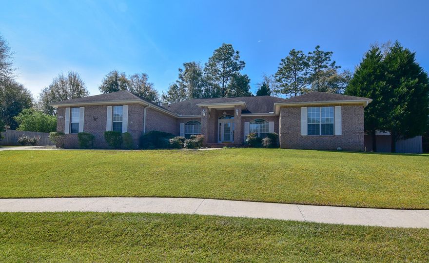 This spacious home in Silver Oaks is ready and waiting for you. With four bedrooms plus an office everyone is afforded the privacy they deserve. The family room has a vaulted ceiling, fireplace with gas log (can also be wood burning) and french doors leading to the screened porch. This backyard oasis has a berm with beautiful plantings including colorful azaleas. Your large eat-in kitchen also overlooks this area and features lots of cabinets, extra canned lighting, walk-in pantry, breakfast bar and easy access to both the dining room and the laundry room which also has a sink. The family room, office, dining room and entry have engineered wood flooring and crown molding. A large master bedroom is dressed with crown molding as well, accommodates over sized furniture and leads to the