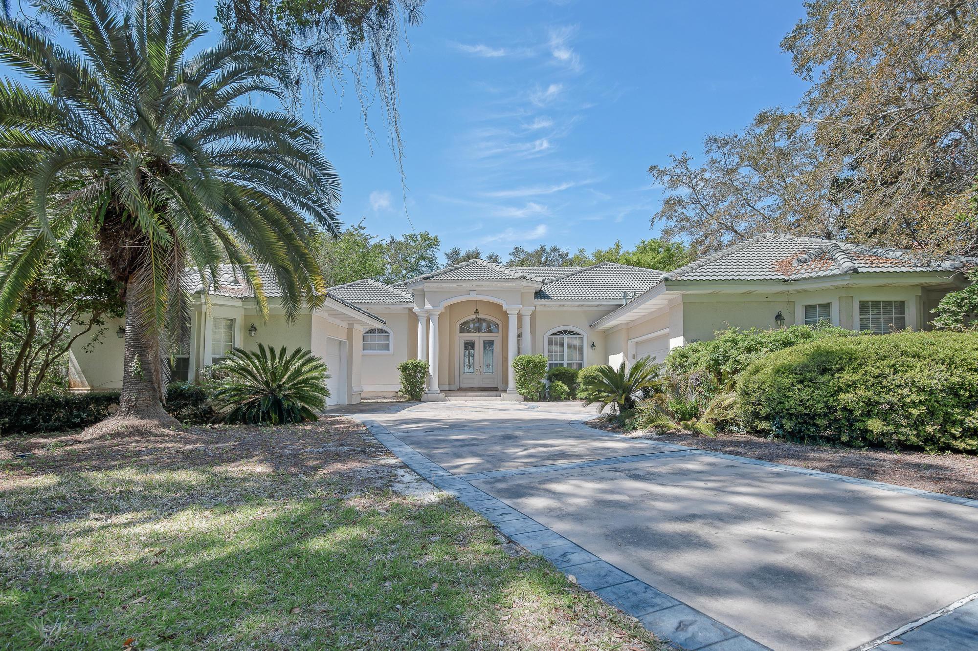 Executive bayfront home with private pool in magnificent gated Kelly Plantation, a golf and tennis community. Spectacular bay views with 131 feet on Choctawhatchee Bay. An extraordinary back yard has a 270' cat walk that leads to boat dock, boat slip, and sun deck. Sea wall along the shore line. This custom built home has an open floor plan with large wet bar off of living room.Nice kitchen with custom cabinets. Solid surface counter tops with granite tile back splash. Spacious Master bedroom, bath, and dressing area.Nine foot triple sliding glass doors in living room offer gorgeous bay views.A large covered lanai at the rear of the home connects to a large screened in pool area. Beautiful for living and entertaining.Two car garage plus an additional one car garage.