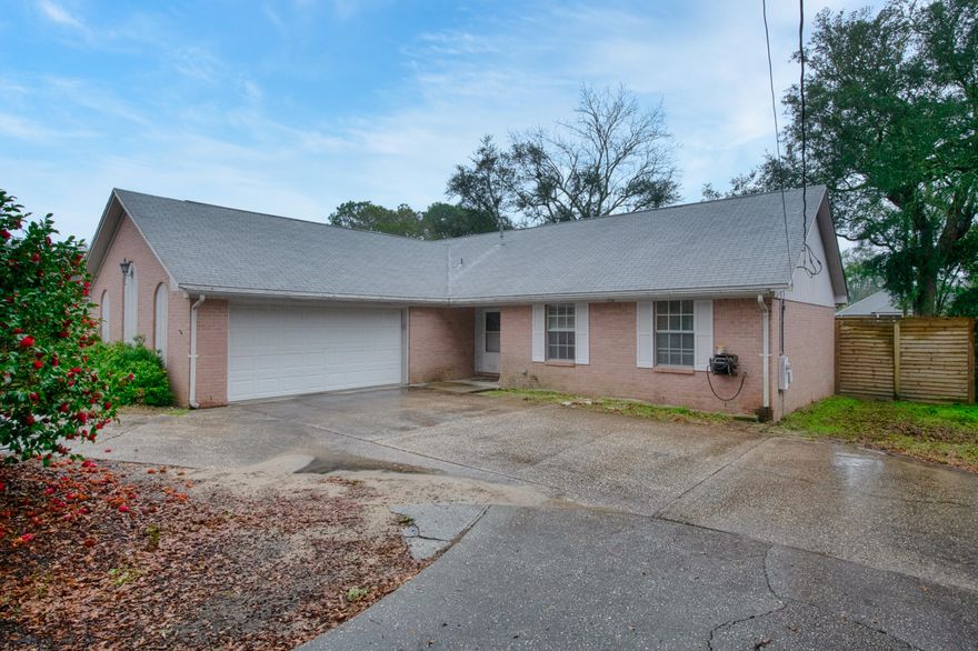 PERFECT property for a first time home buyer or an investor! With a little paint and flooring this property would be great as a rental with its abundant parking or great for a family trying to get into Niceville without a ton of money. The backyard has about 77 feet of waterfront on the pond in back making a gorgeous backdrop if you put in a cute seating area in the back.
