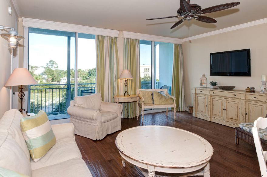 Fewer than 150 yards from stunning white sand beach and the tranquil, emerald green waters of the Gulf of Mexico is this inviting condo unit within the most recently completed building surrounding the colorful town center of Gulf Place, Six Palms. Situated on Scenic Highway 30A, Gulf Place is home to lively on-site dining and boutique retail destinations, bike and water sport rentals, as well as seasonal concerts and events hosted on its sprawling two-acre green. There is even a local pharmacy, conveniently located on the ground floor of Six Palms. The most difficult choice you will face is whether to spend the day drenched in the warm Florida sunshine on the beach, or around one of three nearby community pools.