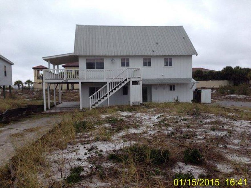 So Close to the Beach... Awesome Beach Home on Tang O Mar. Enjoy plenty of privacy on this private rode with beach access at the end of the street. This older beach cottage sits on a great lot with great views. Home has flood damaged & has extensive discoloration damage that will need to be remediated . Property is being sold subject to HUD Guidelines 24 CFR 206.125. Buyer is required to verify room dimensions.